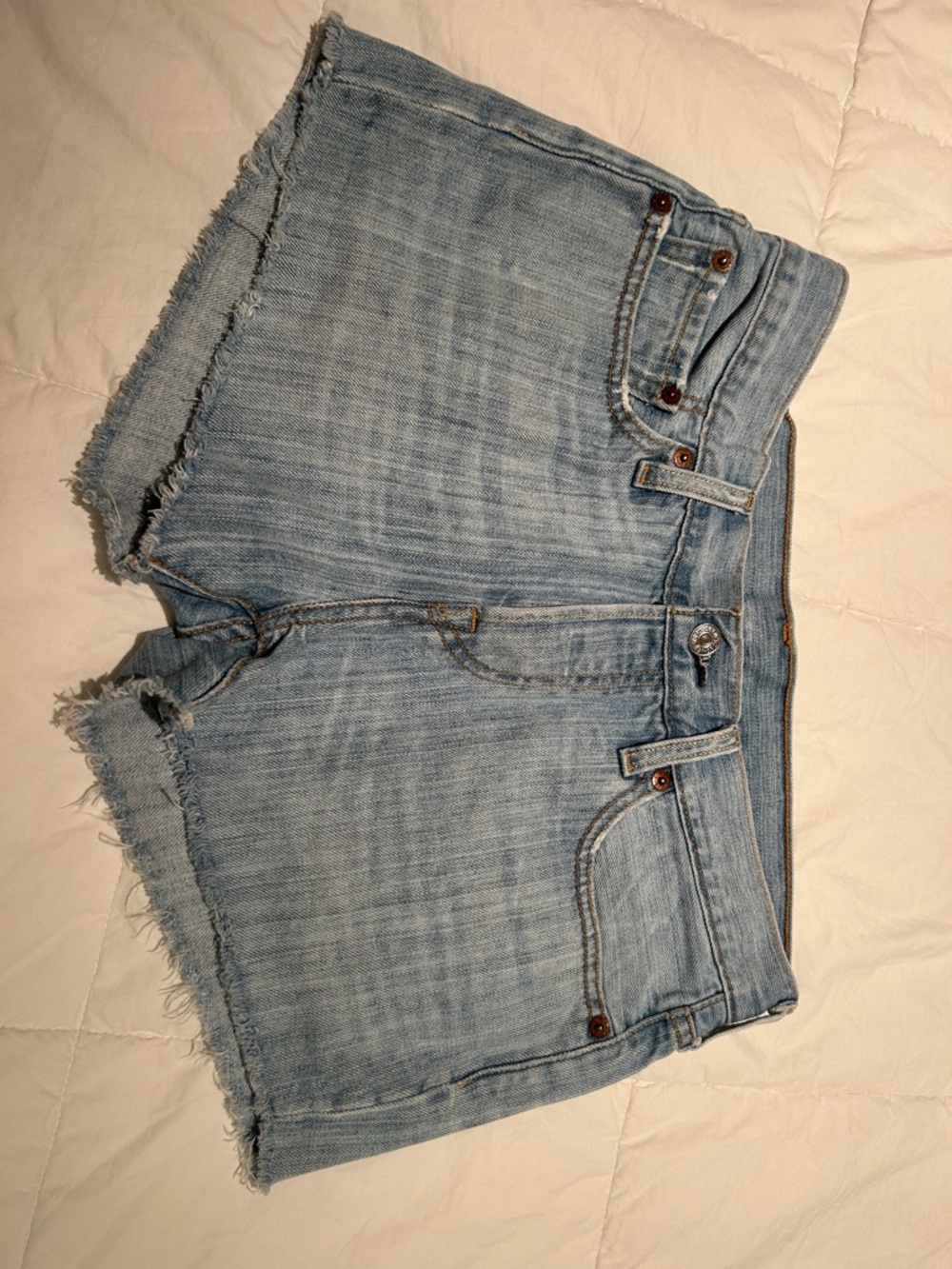 Levi’s Light Wash Denim Cutoff Shorts - Frayed Hem, Classic Five-Pocket